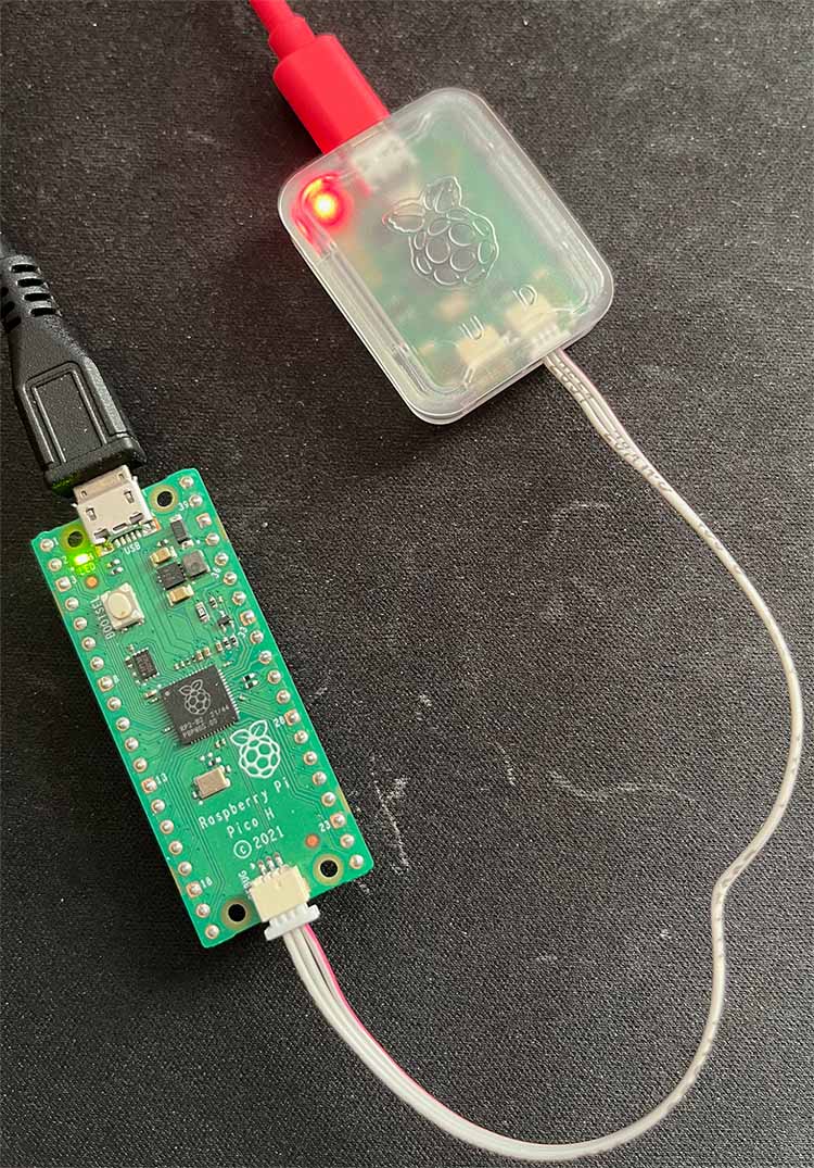 The Raspberry Pi Debug Probe connected to a Raspberry Pi Pico H with the included JST to JST cable